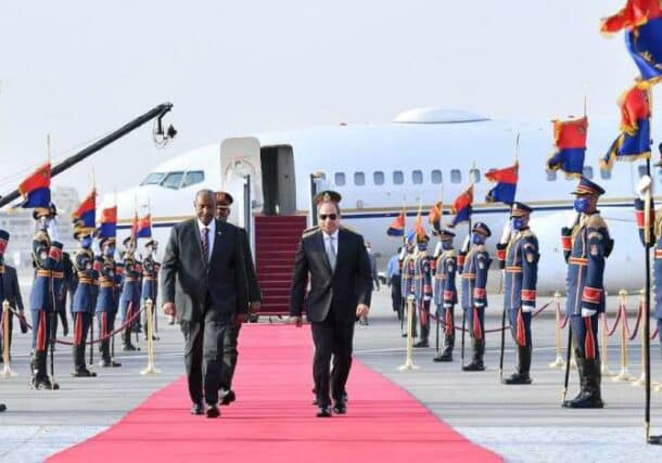 President al-Sisi receives al-Burhan at his arrival at Cairo airport on September 24, 2022 Egyptian presidency photo