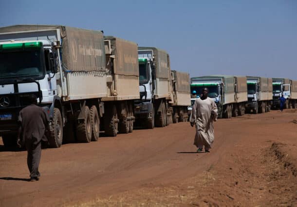 WFP trucks travel from El Fasher to Shangil Tobaya to deliver 350 metric tons of food to the Nifasha and Shaddad IDPs camps on February 10, 2014