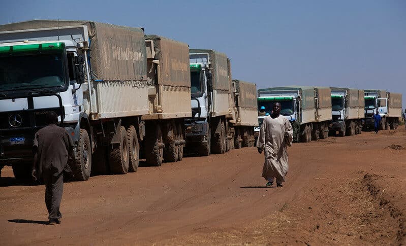 WFP trucks travel from El Fasher to Shangil Tobaya to deliver 350 metric tons of food to the Nifasha and Shaddad IDPs camps on February 10, 2014