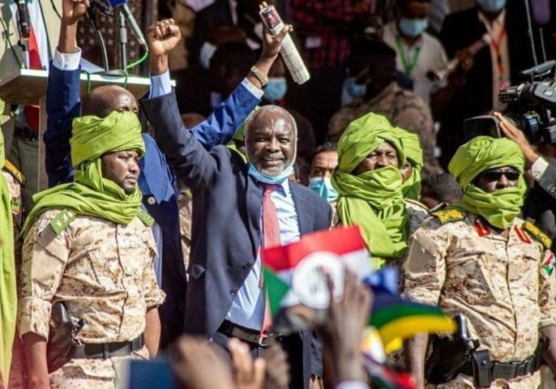 Gibril Ibrahim greets his supporters after his return to Khartoum on November 15, 2020