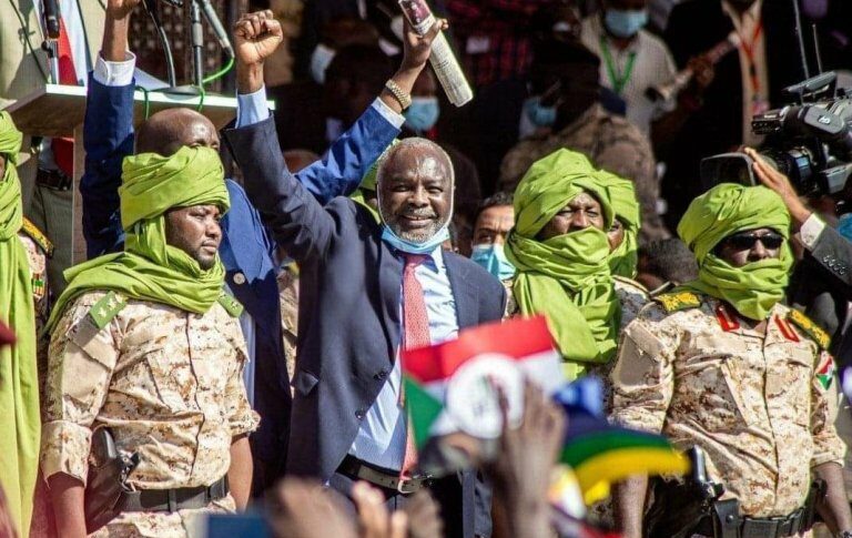 Gibril Ibrahim greets his supporters after his return to Khartoum on November 15, 2020