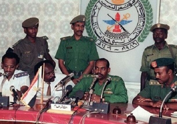 Brogadier General Omer al-Bashir reads his first communiqué on 30 June 1989