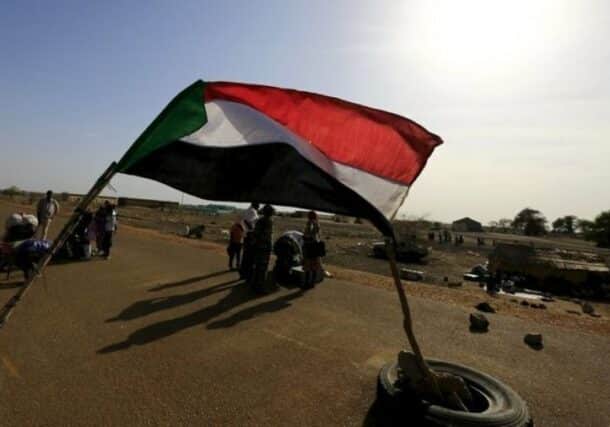 Sudanese military personnel check belongings of South Sudanese fleeing an attack on the South Sudanese town of Rank, at a border gate in Joda, along the Sudanese border, in this April 18, 2014 Reuters