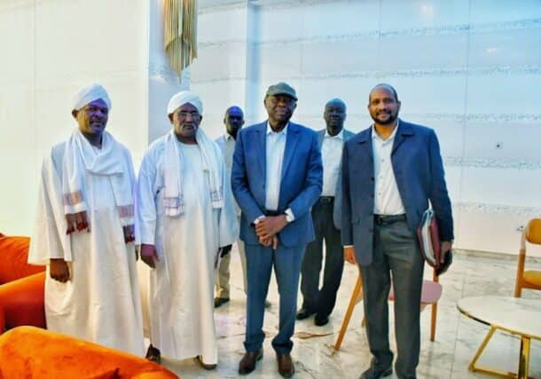 Al-Hilu (2d L) poses with the NUP leaders in Juba