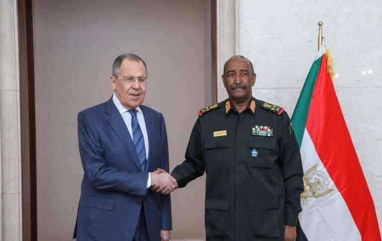 Al-Burhan shakes hands with Russian FM Sergey Lavrov on February 9, 2023