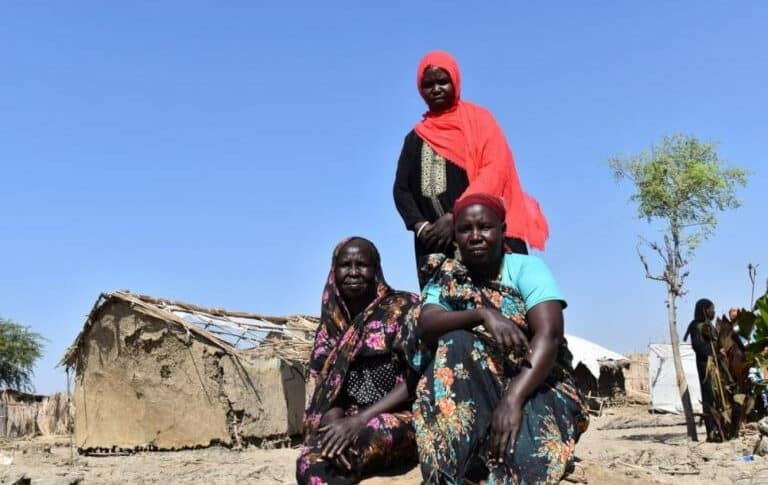 South Sudanese refugees Suzanna, Nyalan and Triza all lost their shelters to floods that hit their camp in Sudan’s White Nile State in November 2022