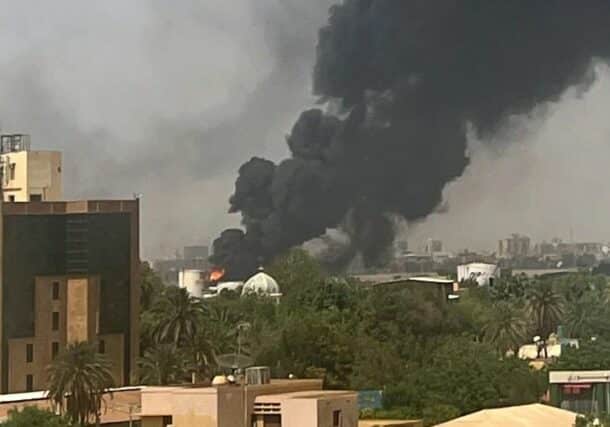 moke from fuel stores at Khartoum airport as fighting intensifies on April 16, 2023