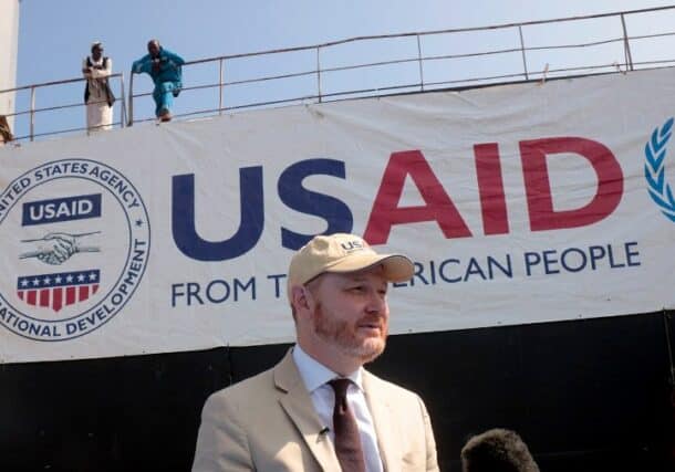 U.S. Ambassador to Sudan John Godfrey speaks during the delivery of tons of corn in Port Sudan as part of the U.S' support for Sudan on November 20, 2022