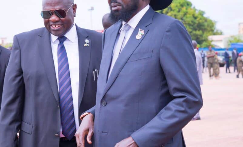 South Sudan's President Salva Kiir shares a light moment with First Vice President Riek Machar at Juba airport, June 27, 2023 (PPU photo)