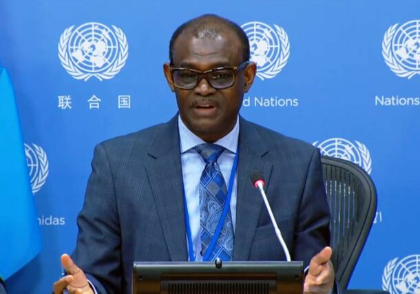 Sudan's Ambassador to the UN Alharith Idris speaks to reporters on May 12, 2023