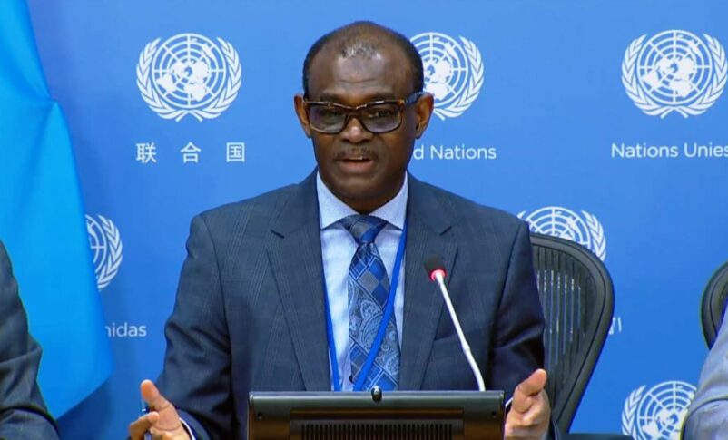 Sudan's Ambassador to the UN Alharith Idris speaks to reporters on May 12, 2023