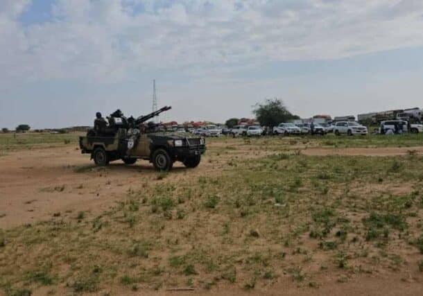 Vehicles and trucks at a gathering point in El-Fasher of North Darfur escorted by the joint force on August 16