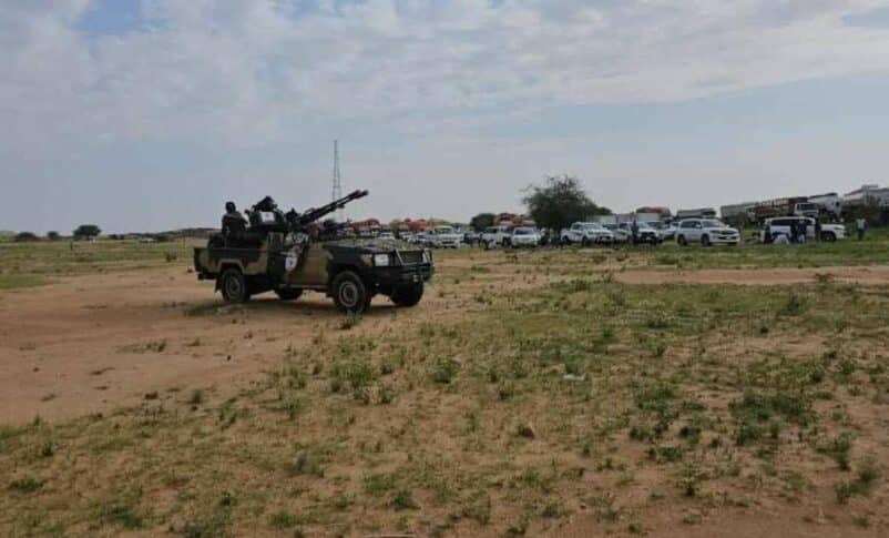Vehicles and trucks at a gathering point in El-Fasher of North Darfur escorted by the joint force on August 16