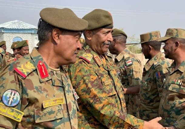 Al-Burhan greets officers at Sinkat military base on September 2, 2023