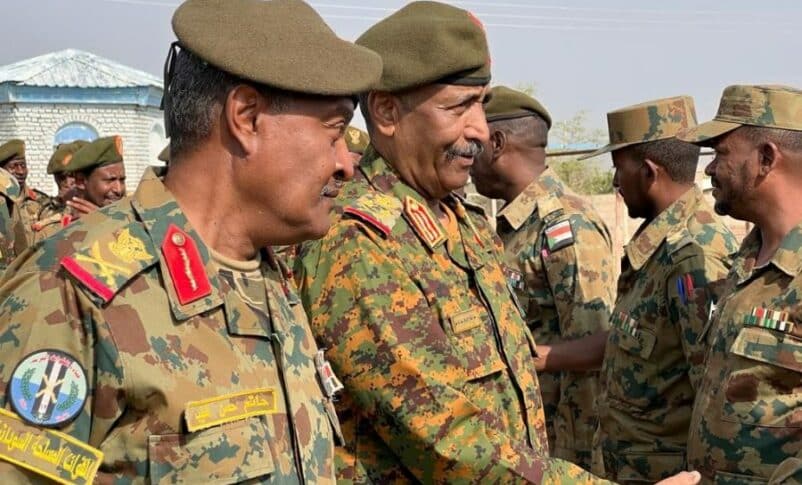 Al-Burhan greets officers at Sinkat military base on September 2, 2023