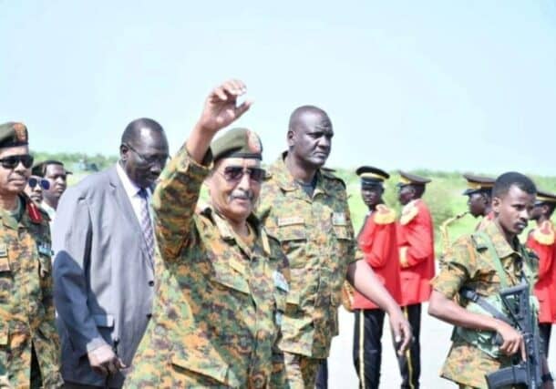 Al-Burhan waves hand after his arrival in Ed Damazin on September 9, 2023