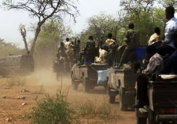 Sudanese soldiers patrol the Daldako area, about 20 kilometres northeast of Kadugli, after recapturing it from rebels on May 20, 2014 AFP