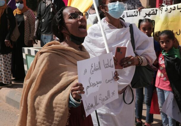 Women chant slogans protesting violence against women before the U.N. rights office in Khartoum, Sudan, Feb. 2, 2022. (AP photo)