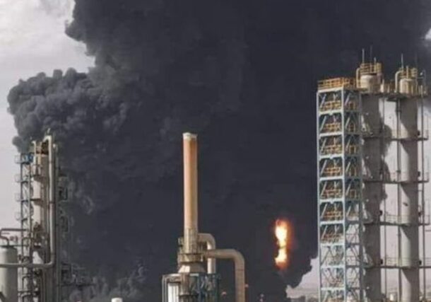 A plume of smoke rises from the Khartoum Refinery, a China-Sudan joint venture, after it was hit by shelling on November 7, 2023.