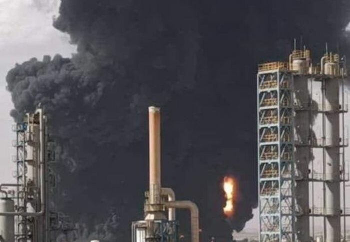 A plume of smoke rises from the Khartoum Refinery, a China-Sudan joint venture, after it was hit by shelling on November 7, 2023.