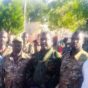 Youssef Karjola (L) SLM-AW military commander, and Al-Sadiq Al-Fakka (C) a Sudanese army officer poese in El Fasher on November 24, 2023