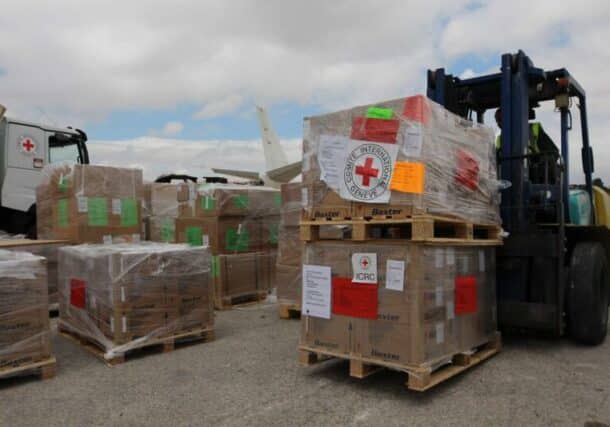 A forklift loading boxes of humanitarian aid in Amman, before loading it on a plane destined to Port Sudan, on April 30, 2023 (AFP ICRC Photo)