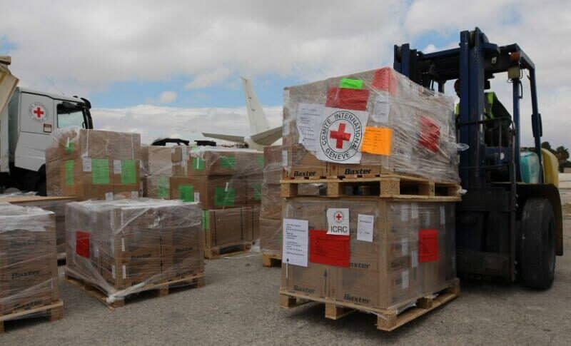 A forklift loading boxes of humanitarian aid in Amman, before loading it on a plane destined to Port Sudan, on April 30, 2023 (AFP ICRC Photo)