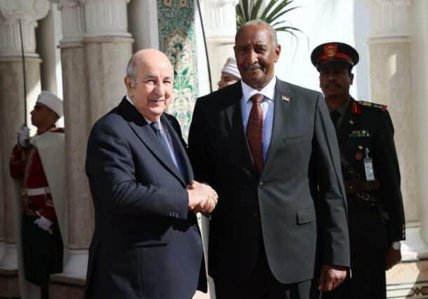 Algerian President Abdelmadjid Tebboune receives Sovereign Council Chairman Abdel Fattah al-Burah at the entrence of the presidential palace in Alger on January 28, 2024.