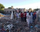 Civilians inspect houses bombed in Al-Qutaina of the White Nile States on January 14, 2024