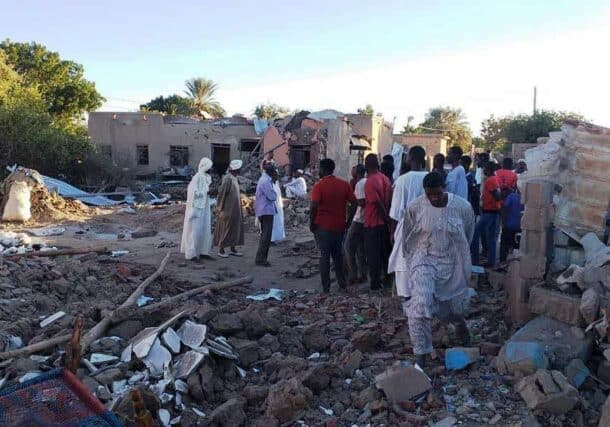 Civilians inspect houses bombed in Al-Qutaina of the White Nile States on January 14, 2024
