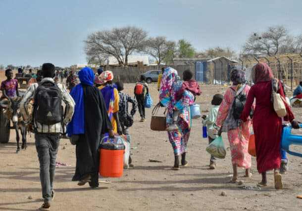 Civilians who fled the war-torn Sudan following the outbreak of fighting between the Sudanese army and the paramilitary Rapid Support Forces (RSF) walk at the Joda South border point, in Renk County, Upper Nile state, South Sudan April 30, 2023. (Reuters/Photo)