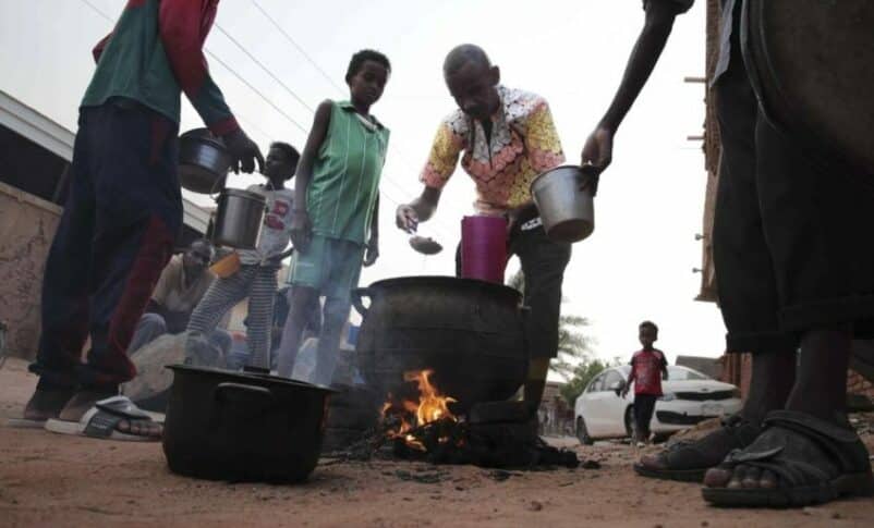 People prepare food in a Khartoum neighbourhood Friday, June 16, 2023. (AP photo
