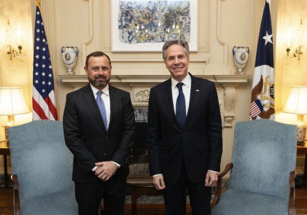 U.S. Secretary of State Blinken poses with Special Envoy Perriello
