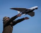 A Ukrainian soldier launches a Furiia model reconnaissance drone (Reuters photo)