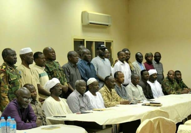 Leaders of Darfur groups pose ensemble after agreement to join efforts against the RSF in Barkal on April 28, 2024