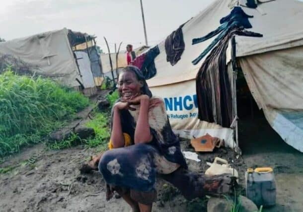 A Sudanese refugee woman weeps in the aftermath of violent clashes between Ethiopian forces and rebels near a camp in Kumer, Amhara region, on July 17, 2024