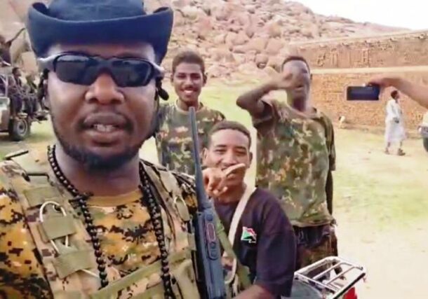 Sudanese soldiers pose in undisclosed area in Central Sudan ahead of an attack on the RSF positions, on July 15, 2024