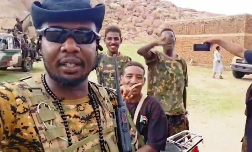 Sudanese soldiers pose in undisclosed area in Central Sudan ahead of an attack on the RSF positions, on July 15, 2024