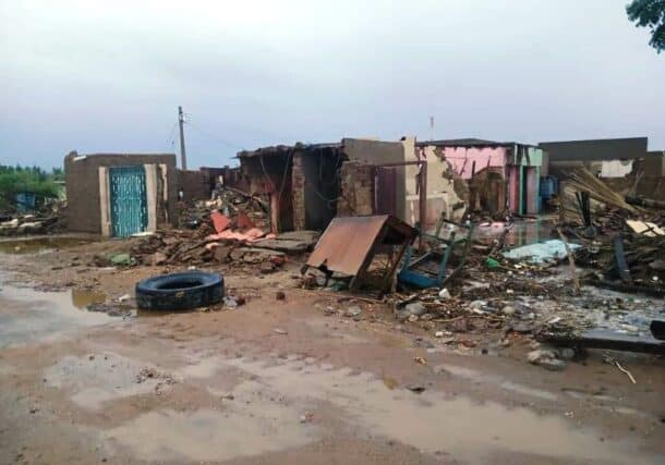 Homes reduced to rubble after flooding in Abu Hamad on August 12, 2024