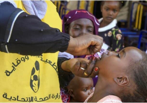 A nurse administers the cholera vaccine to a child in Sudan's Gedaref city on 20 November, 2023. AFP photo