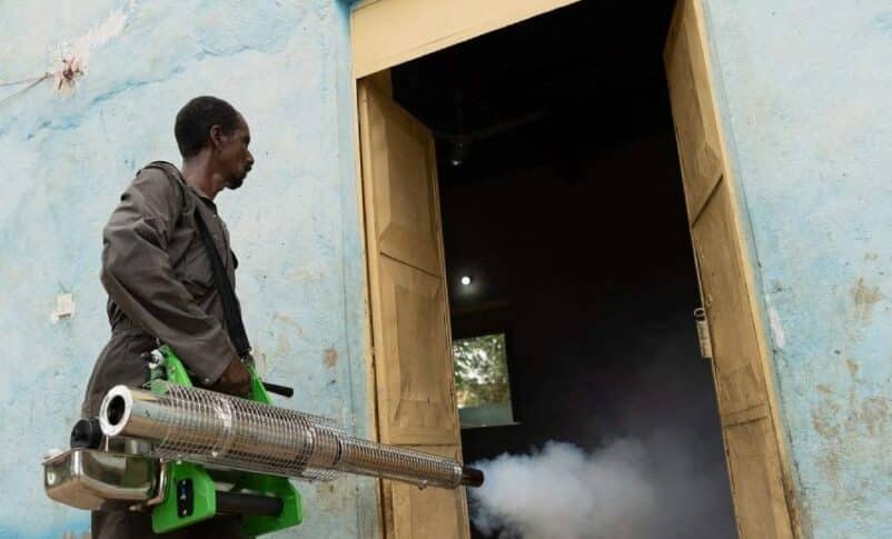 A sanitation worker sprays disinfectant to combat the spread of disease, in Kassala state in eastern Sudan on August 20, 2024. (AFP photo)
