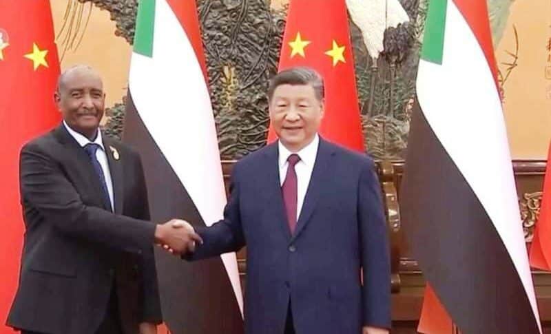 Al-Burhan shakes hands with Chinese President Xi Jinping on September 6, 2024