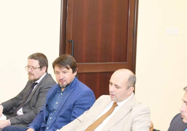 Viktor Chemodanov, (R) Chairman of the Russian-Sudanese Business Council and his delegation meet Sudan's Minister of Minerals, Mohamed Bashir Abunommo (unseen) on September 17, 2024
