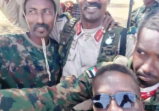 RSF commander Abu Aqla Kakil pose with the Sudanese army soldiers after his defection in Al-Jazirah state on October 20, 2024