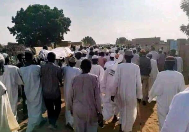 Villagers carry the bodies of those killed by the RSF to their burial site in Al-Damukiya of North Kordofan on October 8, 2024
