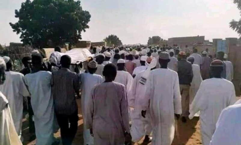 Villagers carry the bodies of those killed by the RSF to their burial site in Al-Damukiya of North Kordofan on October 8, 2024