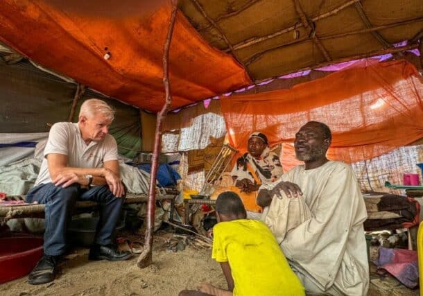 Despite the challenges of displacement and limited mobility, Anwar and his family remain resilient after fleeing Khartoum for Port Sudan, NRC Secretary General Jan Egeland hears their story. on November 18, 2024 (NRC photo)