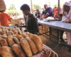 People gather to get bread while clashes rage between the Sudanese army and the paramilitary RSF in Khartoum North, on April 24, 2023. Reuters photo