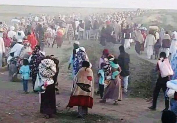Terrified civilians stream out of Al-Hilalliya after a wave of killings by the RFS on Nov 4, 2024