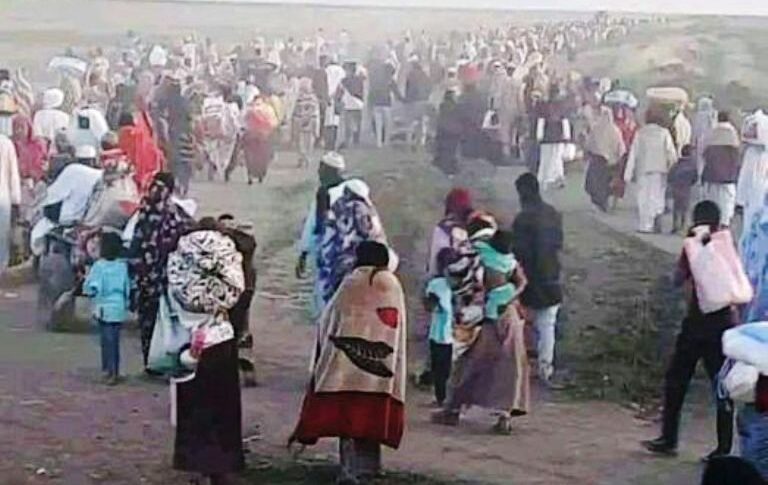Terrified civilians stream out of Al-Hilalliya after a wave of killings by the RFS on Nov 4, 2024